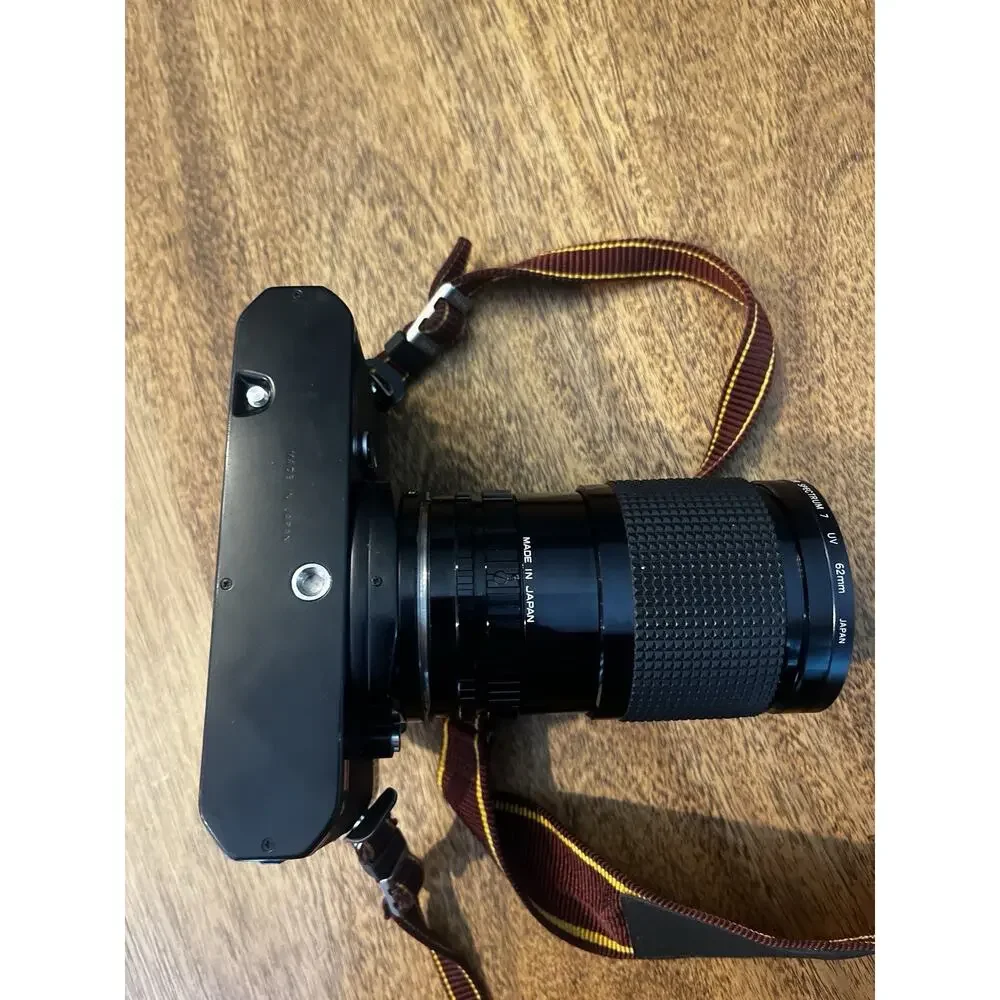 Nikon Black Camera with Brown Strap